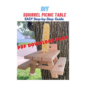 May include: DIY Squirrel Picnic Table, Easy Step-by-Step Guide, PDF Download Plan. A small wooden picnic table is attached to a tree trunk with a corn cob on top.