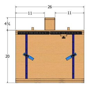 May include: Top-down view of a wooden woodworking table with blue and black components. The table is 26 inches wide, 20 inches tall, and 4.75 inches deep. The table has two blue clamps and a central wooden structure.