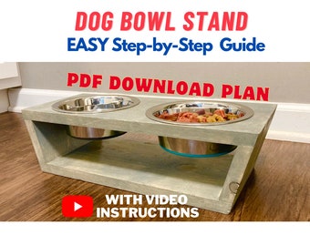 May include: A DIY dog bowl stand made of wood with a light gray stain. The stand has two stainless steel bowls, one with dog food and the other empty. The stand has a beveled edge and a raised platform. The text on the image reads "DOG BOWL STAND EASY Step-by-Step Guide PDF DOWNLOAD PLAN WITH VIDEO INSTRUCTIONS".