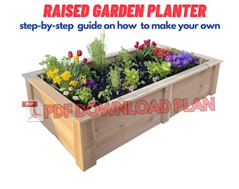 May include: A rectangular, wooden raised garden planter filled with soil and various colorful flowers and plants. The planter has a light brown finish and is labeled with the text "RAISED GARDEN PLANTER" and "PDF DOWNLOAD PLAN".