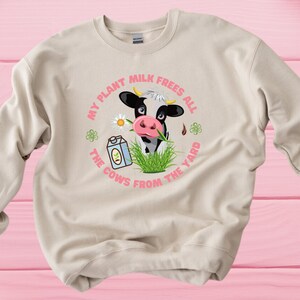 My oat milk frees all the cows from the yard sweatshirt/sweater. Vegan, dairy free animal slogan crew neck jumper. Pink, white, grey, black.