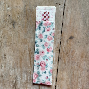 Nail file case, nail file cover. Pink, white and green floral fabric. Emery board case.  File not included. Approx 8 x 2&quot;