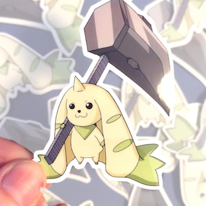 Peut inclure: Un personnage de dessin animé jaune avec des oreilles vertes et un bandana vert tenant un grand marteau argenté. Le personnage a une expression joyeuse et se tient sur un fond blanc.