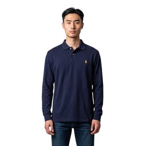 May include: A long-sleeve navy blue polo shirt featuring a collar, a buttoned placket, and a small yellow embroidered logo on the left chest. The shirt is paired with dark blue denim jeans, creating a simple and classic look for any occasion.