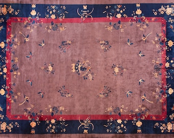 May include: A vintage Chinese rug with a deep purple background and a floral pattern. The rug has a dark blue and red border with intricate designs.