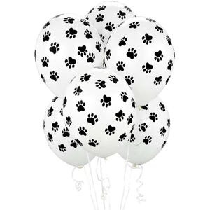 K&ouml;nnte beinhalten: Ein B&uuml;ndel wei&szlig;er Ballons mit schwarzen Pfotenabdr&uuml;cken.