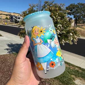 Alice glass tumbler, plastic rhinestone lid.