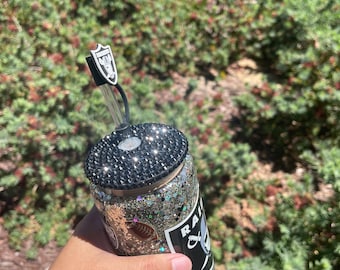 Football glass snow globe