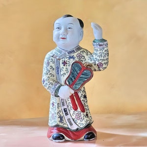 Qing Dynasty Porcelain Boy Figure: Oriental Pottery Art, Circa 1920