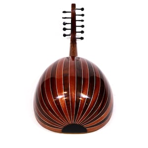 May include: A wooden oud, a stringed musical instrument, with a distinctive pear-shaped body. The body is made of alternating dark and light brown wooden strips. The neck has tuning pegs. The instrument is set against a white background.