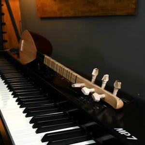 cura saz, saz, turkish cura, professional cura, erasaz saz, erasaz cura instrument, cura instruments, cura photo, cura sazs, carved cura, carved cura saz, erasaz