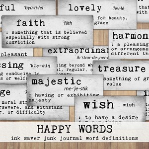 May include: A collection of white cards with black text, each card features a positive word and its definition. Words include: beautiful, faith, lovely, harmony, blessing, majestic, treasure, wish, courage, inspire, and extraordinary. The cards are arranged in a collage on a woodgrain background. The text at the bottom reads "HAPPY WORDS ink saver junk journal word definitions".