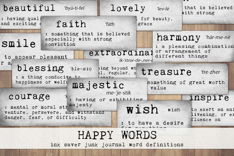 May include: A collection of white cards with black text, each card features a positive word and its definition. Words include: beautiful, faith, lovely, harmony, blessing, majestic, treasure, wish, courage, inspire, and extraordinary. The cards are arranged in a collage on a woodgrain background. The text at the bottom reads "HAPPY WORDS ink saver junk journal word definitions".