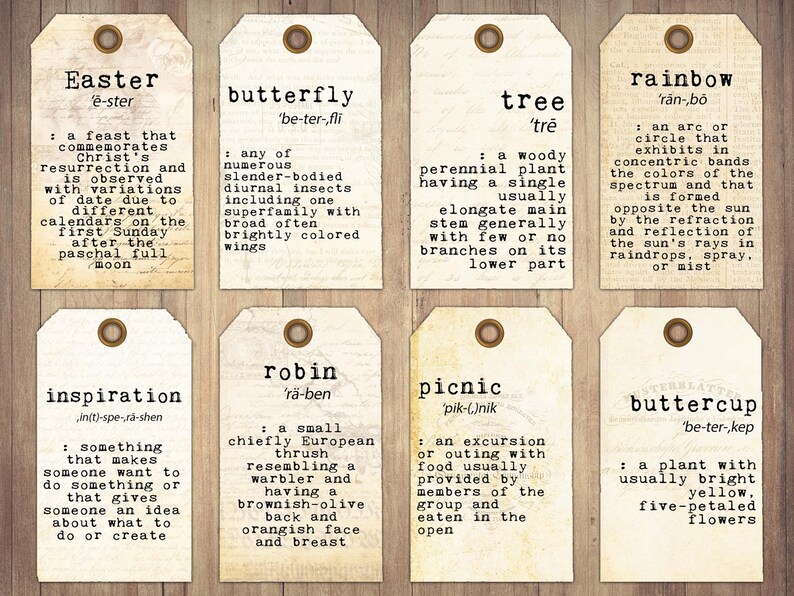 May include: Ten vintage-style tags with definitions of words like Easter, butterfly, tree, rainbow, inspiration, robin, picnic, and buttercup. Each tag has a different color and design.