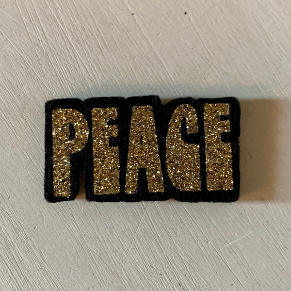 Broche Paillettes mot PEACE