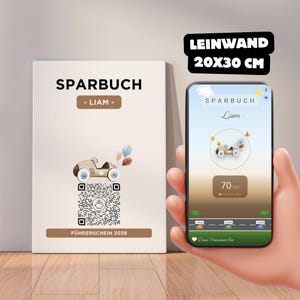May include: A white canvas print with the text "SPARBUCH - LIAM -" and a vintage car illustration. A smartphone displays a matching design with a savings goal of 70 EUR. The canvas measures approximately 20 x 30 cm.