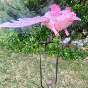 Flying pig kinetic balancing garden art stake