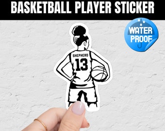 May include: Black and white sticker of a basketball player with the name "SHEPHERD" and the number "13" on the back of their jersey. The player is holding a basketball and has their back to the viewer. The sticker is labeled "WATERPROOF".