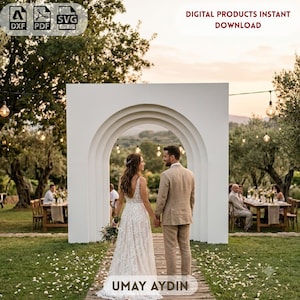 May include: A white arched wedding backdrop structure featuring a layered, recessed design. The digital product includes DXF, PDF, and SVG file formats for instant download. The arch is positioned outdoors on a wooden path in a garden setting.