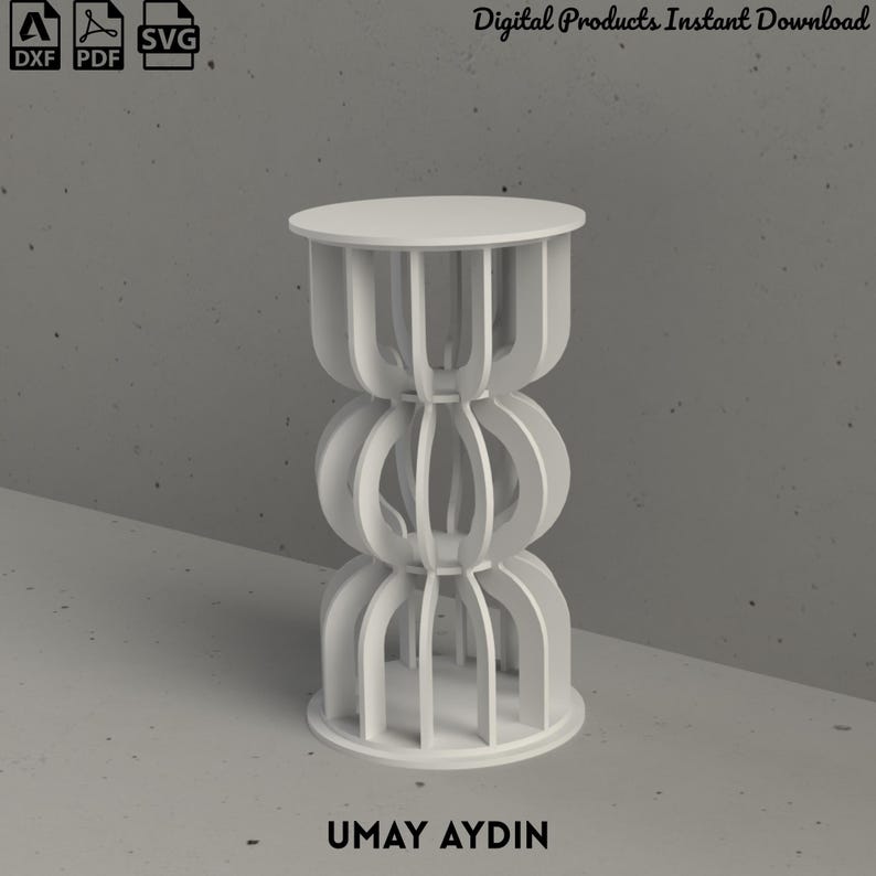 May include: A white, cylindrical, multi-tiered stand featuring a series of vertical, curved slats arranged in three distinct sections. The structure includes a flat circular top and base. The text Digital Products Instant Download and UMAY AYDIN are visible.