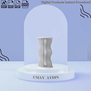 Op de afbeelding: Een wit cilindrisch object met een verticaal, golvend lattenontwerp. De tekst "UMAY AYDIN" staat op de basis gedrukt. Pictogrammen voor DXF-, DWG-, PDF- en SVG-bestandsformaten zijn linksboven zichtbaar, met de tekst "Digital Products Instant Download" bovenaan.