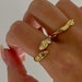 see more listings in the 18k Gold and Stainless section