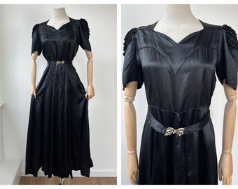 L 1930's Black Gleaming Woven Gown with Puffed Sleeves and Belt