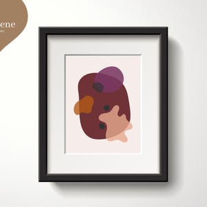 Puede incluir: Impresión artística abstracta enmarcada, con una composición de formas orgánicas en tonos burdeos, naranja y morado. La obra de arte está enmarcada en un marco negro. El arte es de RosieJene Art Company.