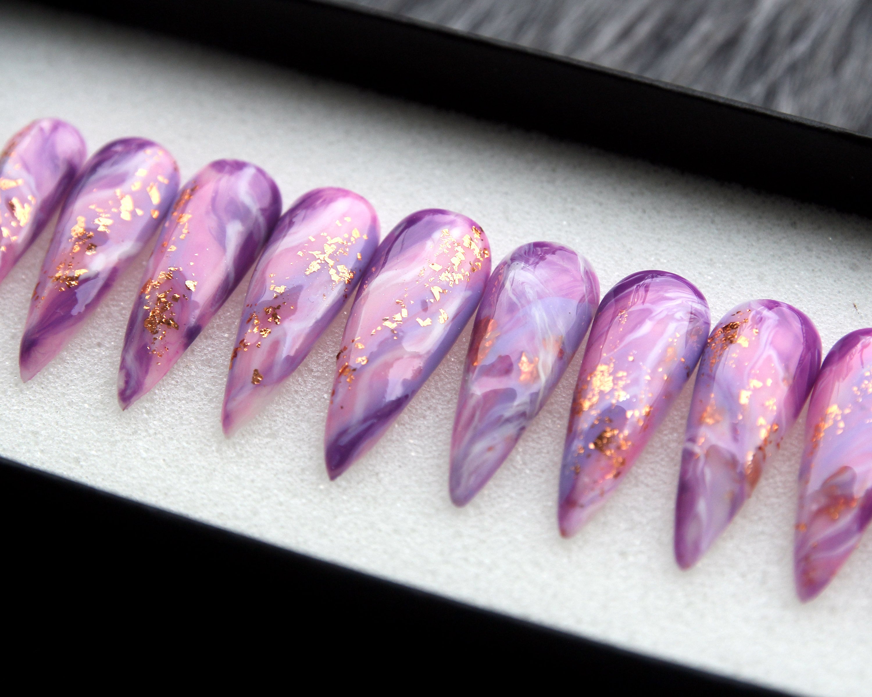 Stunning Vibrant Purple Marble Nails