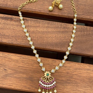 Pearl and ruby necklace and earrings