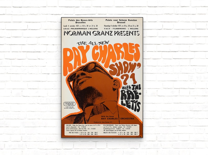 May include: A vintage concert poster for Ray Charles's "The All New Ray Charles Show '71" with the Raeletts. The poster features a close-up of Ray Charles's face in a bright orange and brown colour scheme. The text "Norman Granz Presents" is at the top of the poster.