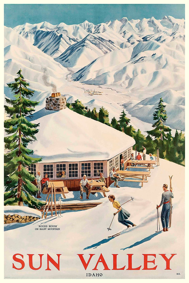 Puede incluir: Un cartel de viaje vintage para Sun Valley, Idaho, que presenta un paisaje monta&ntilde;oso nevado con una caba&ntilde;a y esquiadores. El texto "Round House on Baldy Mountain" es visible en la esquina inferior izquierda. El cartel est&aacute; en un estilo retro con colores brillantes y letras en negrita.