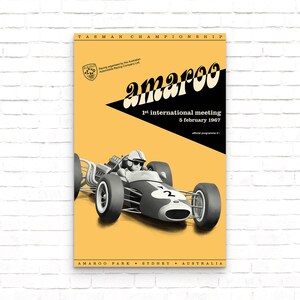 May include: A vintage poster advertising the 1st International Meeting of the 1967 Tasman Championship at Amaroo Park in Sydney, Australia. The poster features a black and white image of a race car with the number 2 on the side.