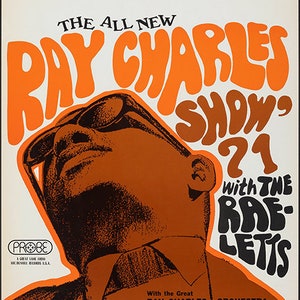 May include: A vintage concert poster advertising "The All New Ray Charles Show '71 with The Raelets" featuring a close-up of Ray Charles wearing sunglasses and a brown suit. The poster is in orange, yellow, and black with the text "Norman Granz Presents" at the top.