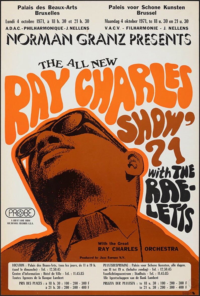 May include: A vintage concert poster advertising "The All New Ray Charles Show '71 with The Raelets" featuring a close-up of Ray Charles wearing sunglasses and a brown suit. The poster is in orange, yellow, and black with the text "Norman Granz Presents" at the top.