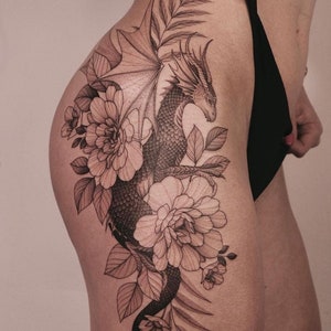 Get this sensual and feminine dragon with flowers design. Show everyone your sexiest side with this tattoo that inspires strength and beauty