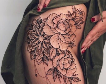 Get this beautiful and sensual flower and mandala tattoo design. Get a free digital tattoo book as a gift!