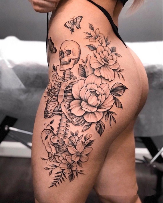 Beautiful, Sensual and Feminine Skull and Skeleton Body Tattoo Design With  Cosmos Flowers and Leaves. Know Its Meaning 