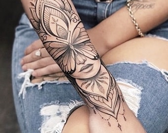 Get now this beautiful and sensual woman&#39;s face tattoo design, whit butterfly and mandalas.