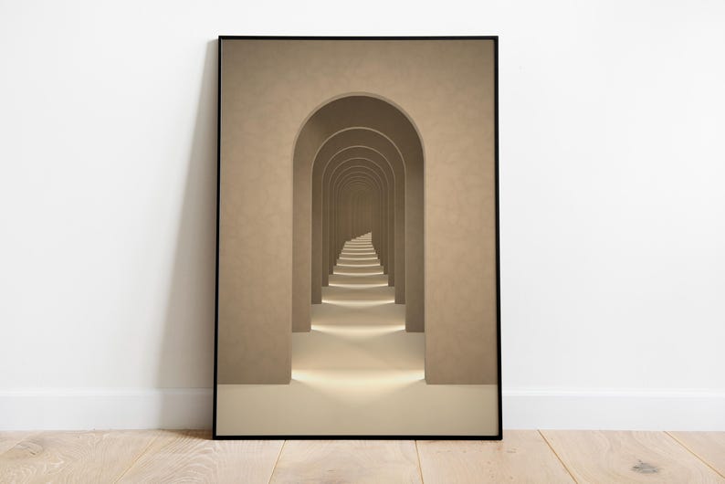 May include: A framed print of a hallway with a series of arches leading to a vanishing point. The walls and arches are a light beige color, and the floor is a light brown.