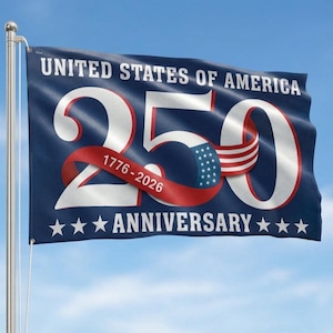May include: A navy blue flag with the text "UNITED STATES OF AMERICA" and "250 ANNIVERSARY". The number 250 is white with a red ribbon that has the dates "1776-2026". The flag has white stars at the bottom.