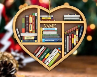 May include: A wooden heart-shaped bookshelf with a variety of books on the shelves. The books have titles such as "Biology", "Physics", "Psychology", "Thermodynamics", "Chemistry", "History", "Construction", "Corporate Finances", "Thermodynamics", "Dictionary", and "Deutsch". The bookshelf is decorated with the word "NAME" in the center.