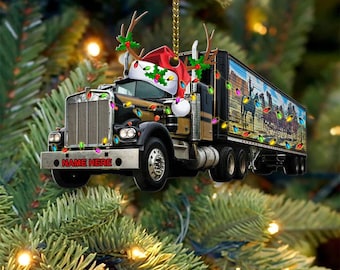 May include: A black semi-truck with a red and white Santa hat and Christmas lights, with the text "NAME HERE" on the front bumper.