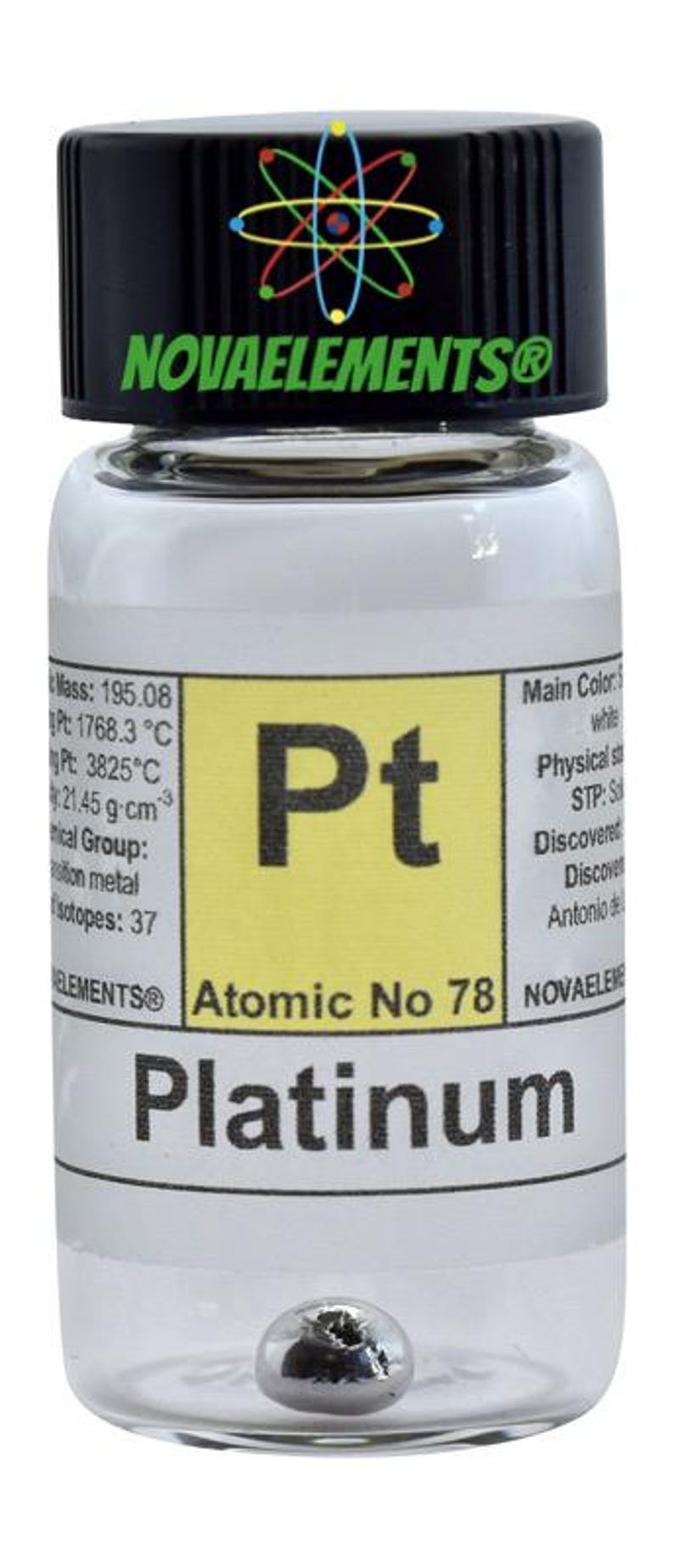 May include: A clear glass bottle with a black lid containing a small silver ball. The label on the bottle reads "Pt Platinum Atomic No 78" and includes information about the element's atomic mass, melting point, boiling point, density, and group.