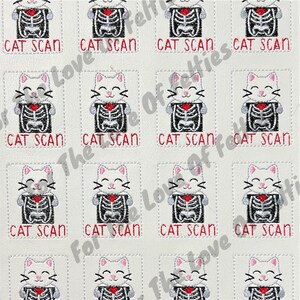 May include: White fabric featuring a repeating pattern of smiling cat illustrations. Each cat holds a skeleton, with the text "CAT SCAN" below. The cats have black whiskers and a red heart.