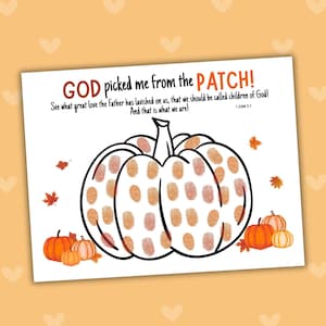 May include: A white print with a large pumpkin design made of fingerprints, and the text "GOD picked me from the PATCH!". Small pumpkins and autumn leaves are also shown.