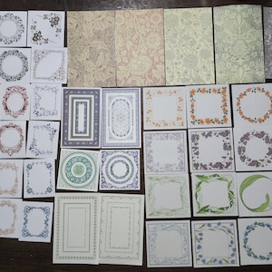 Pode incluir: Uma coleção de molduras de papel decorativas vintage em vários estilos e cores. As molduras são perfeitas para scrapbooking, criação de cartões e outros projetos de artesanato.