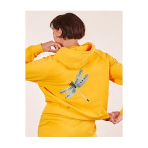 May include: A yellow hoodie with a dragonfly design on the back. The dragonfly is blue, green, and black.