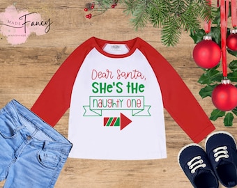 Dear Santa She's or He's the Naughty One | Raglan Shirt, Christmas Funny Shirt, Xmas Graphic Tee, Gifts for Him or Her, Kids Custom T-Shirt