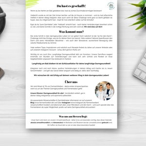 May include: A white and green flyer with the title "Du hast es geschafft!"  The flyer is about gut health and features a photo of two people in white lab coats. The text on the flyer discusses the importance of gut health and provides tips for maintaining a healthy gut.